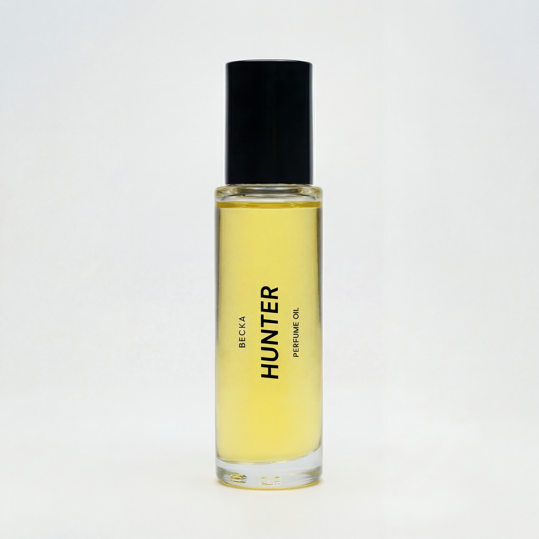 Perfume oil bottle labeled &